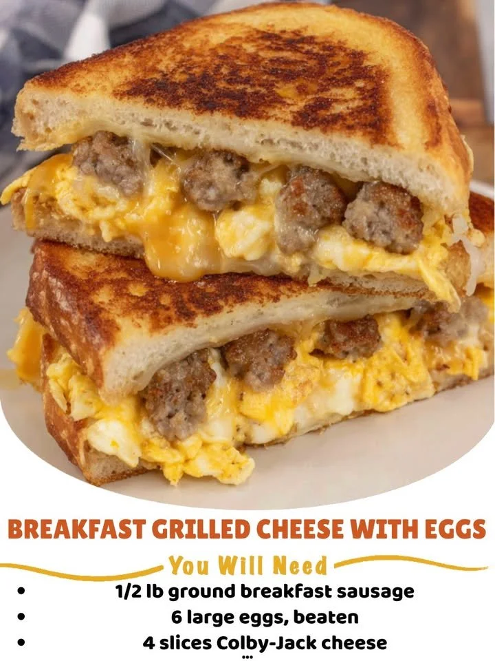 Breakfast grilled cheese sandwich with eggs on a plate