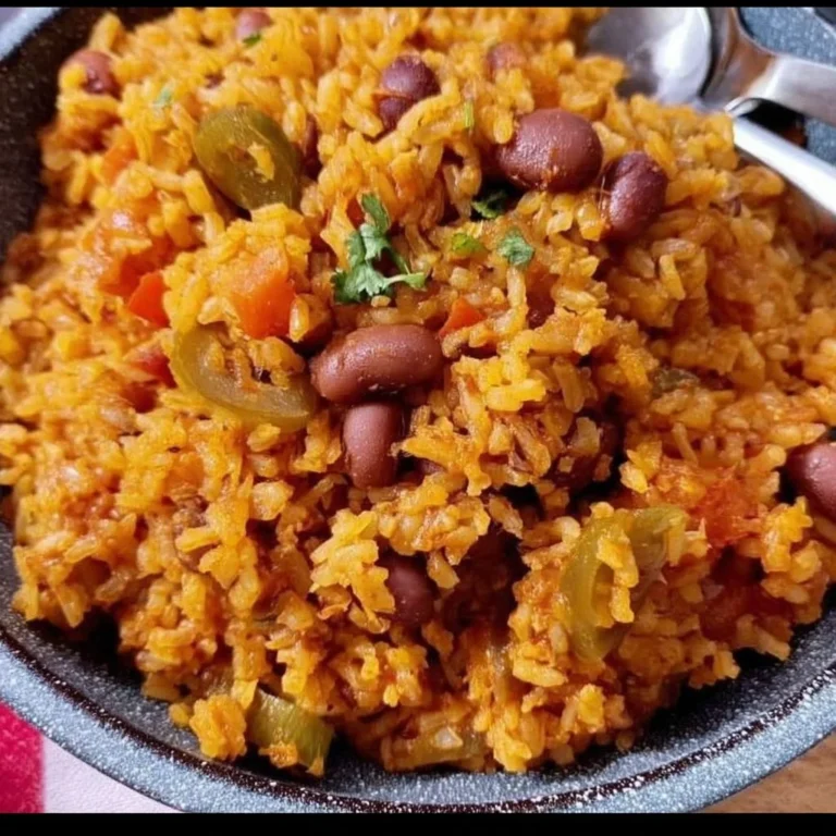 Delicious plate of Spanish Rice and Beans with herbs and spices