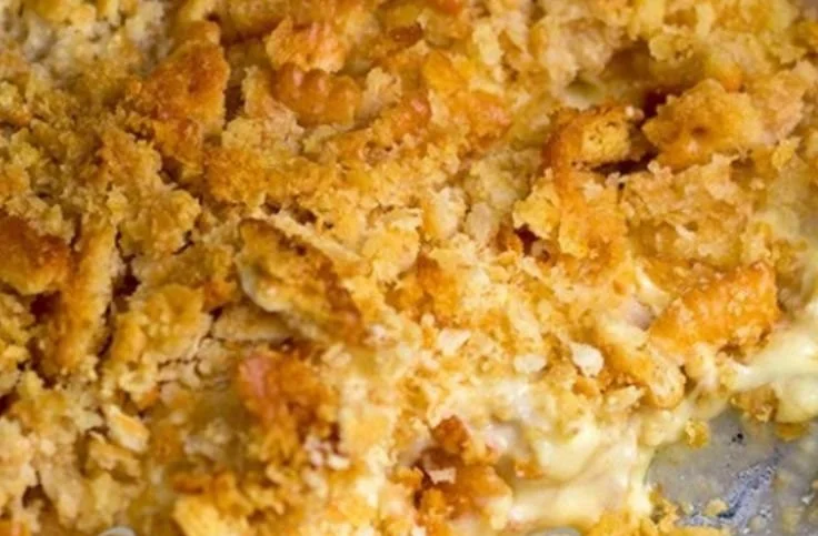 Chicken casserole topped with crispy Ritz crackers, baked to perfection.