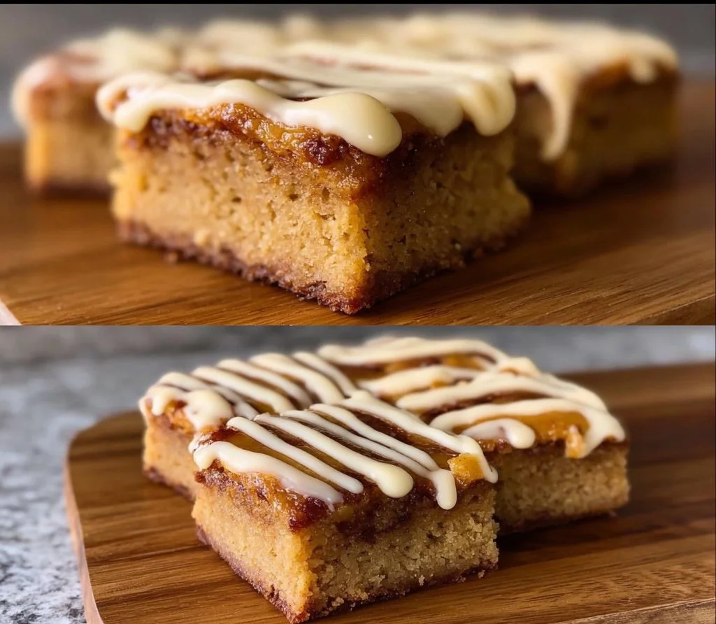 Cinnamon roll blondies topped with icing on a cooling rack