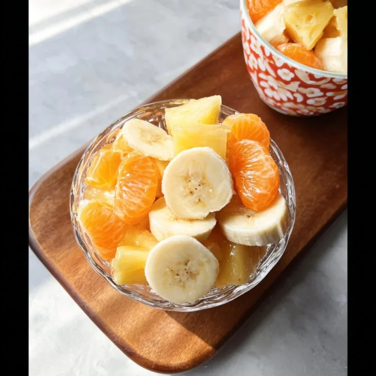 A vibrant Sunshine Salad with colorful vegetables and citrus dressing