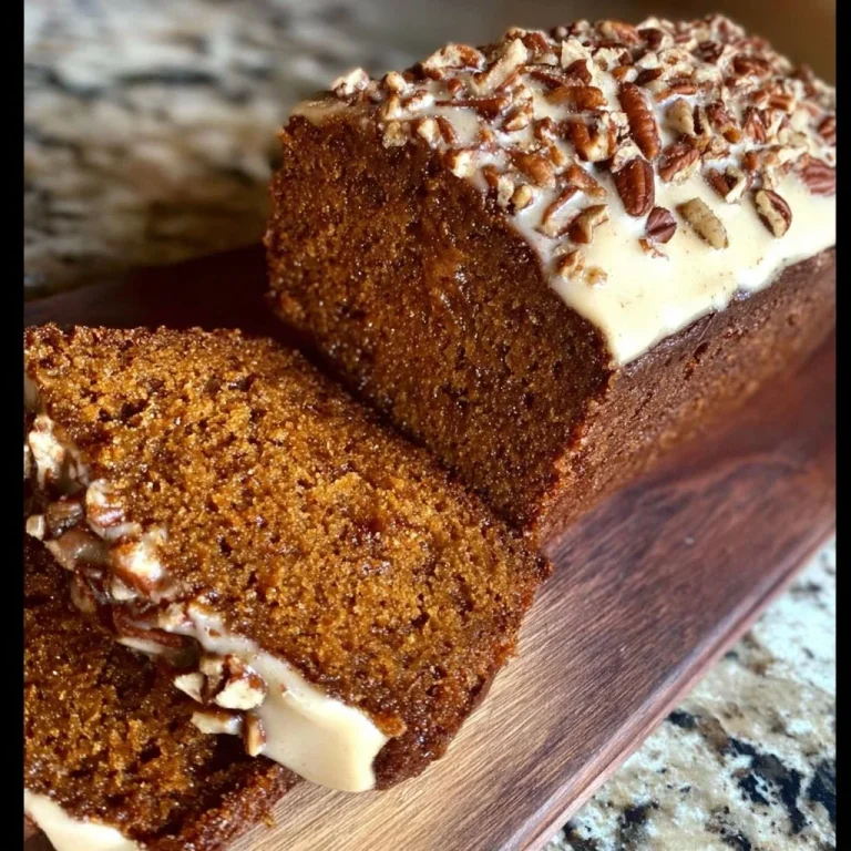 Slice of Starbucks Gingerbread Loaf on a rustic wooden table