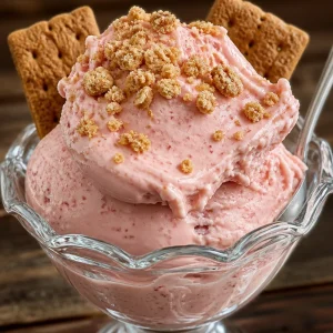 Delicious strawberry frozen yogurt topped with fresh strawberries